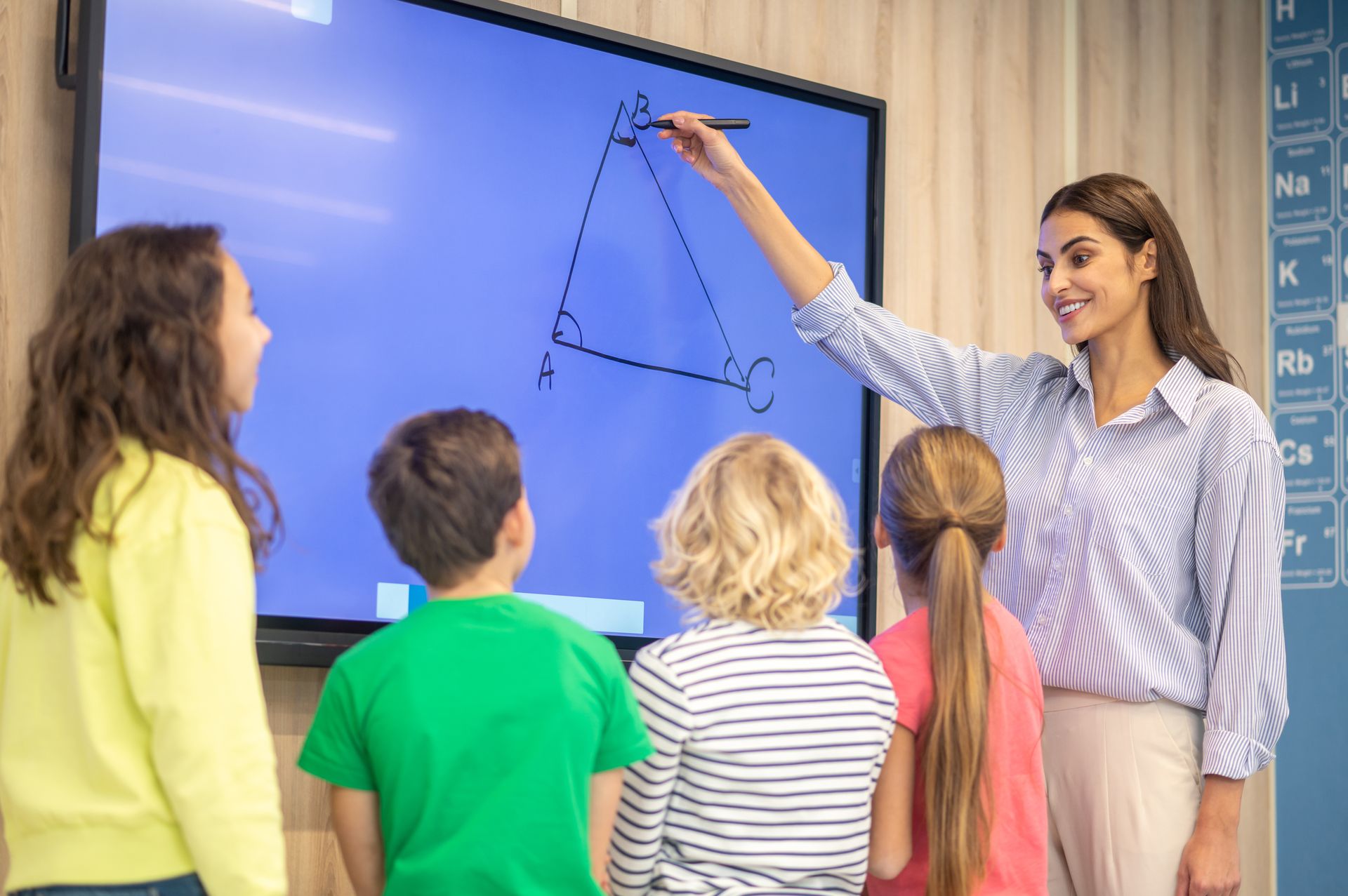 Interactive Panel and teacher learn childs